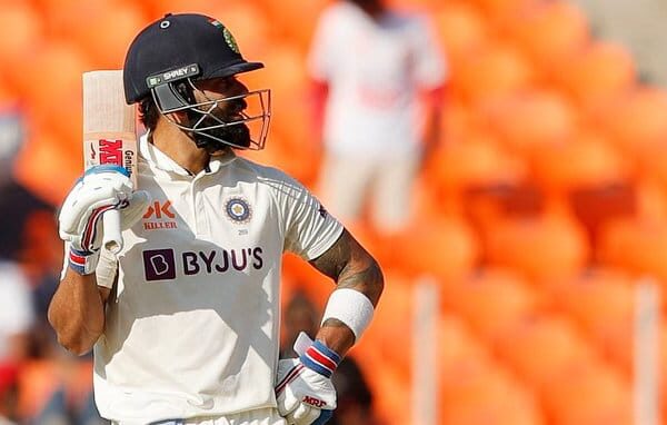 Nathan Lyon in action during a Test match, discussing strategies before the India-Australia series.