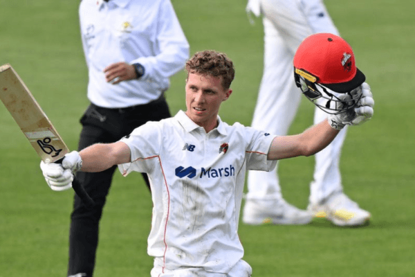 Nathan McSweeney celebrates a century in the Shield match against Tasmania.