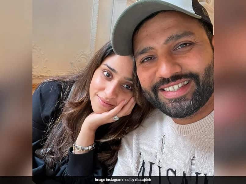 Indian cricket captain Rohit Sharma with his wife and daughter at a public event.