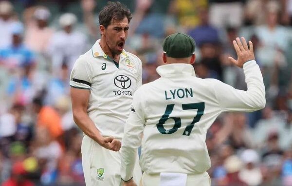 Mitchell Starc celebrates six-wicket haul against India during pink-ball Test.