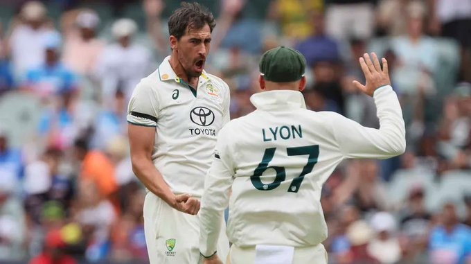 Mitchell Starc celebrates six-wicket haul against India during pink-ball Test.